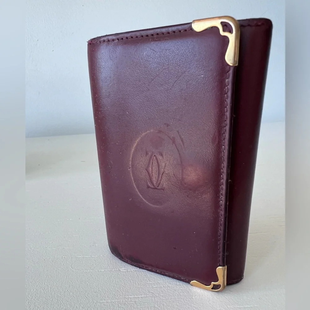 Authentic Must de Cartier, 6 key ring holder . Burgundy calfskin - Picture 1 of 11